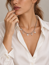 1990s Vintage Nina Ricci Silver Charm Necklace